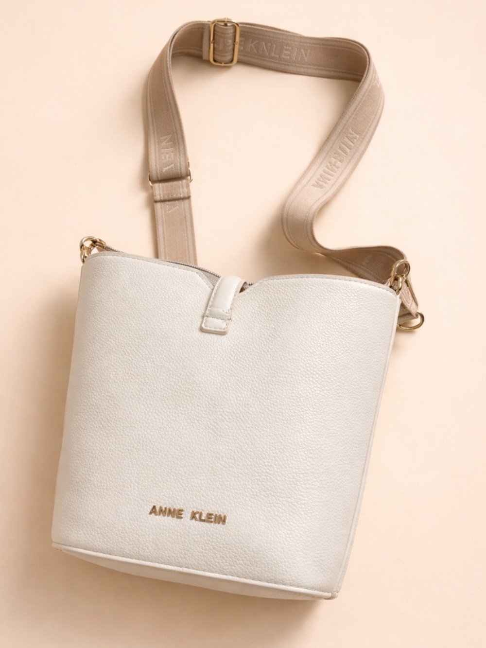 Anne Klein Cream Pebble-Texture Bucket Crossbody with Logo Strap